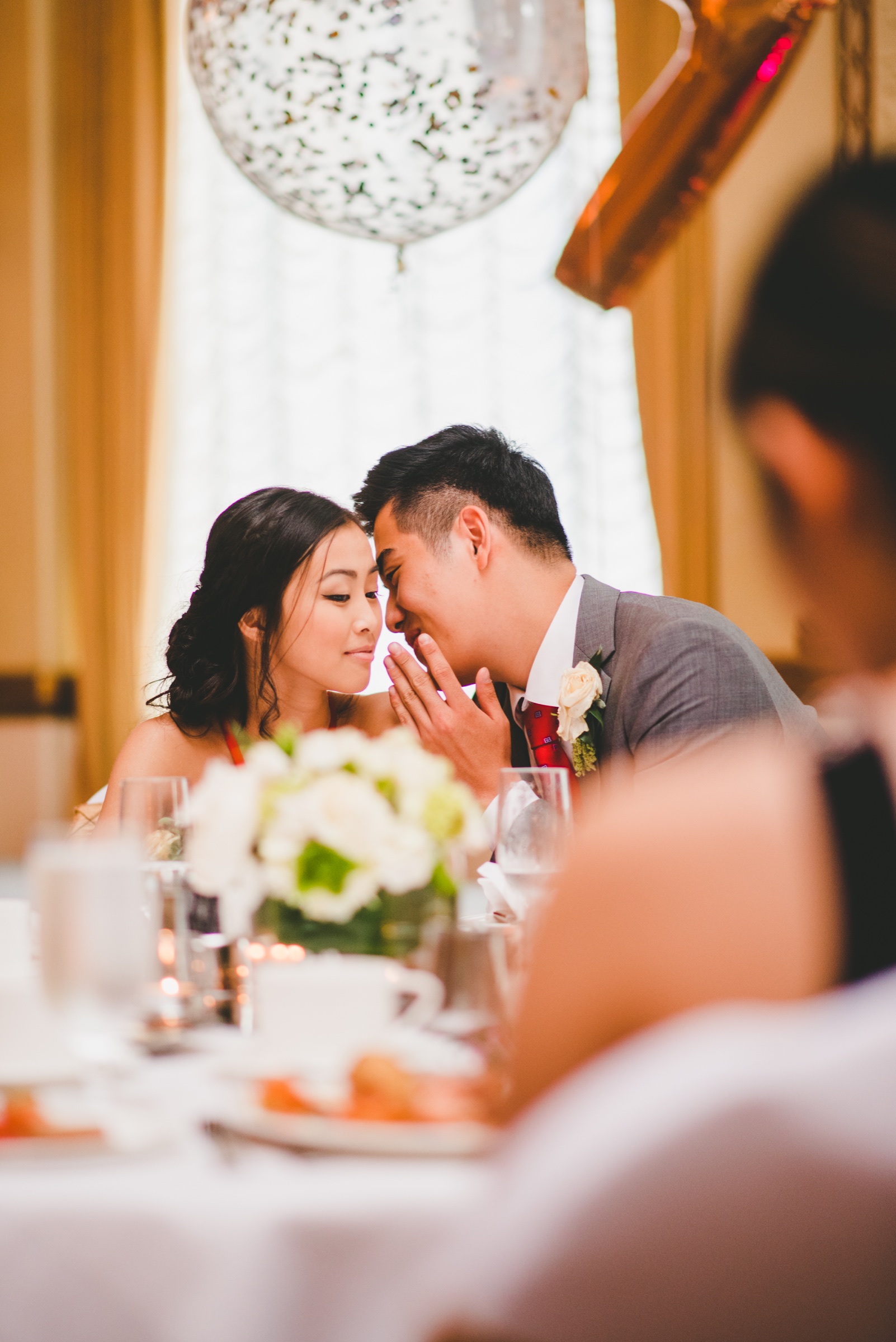 Guests sharing a quiet moment during a formal reception